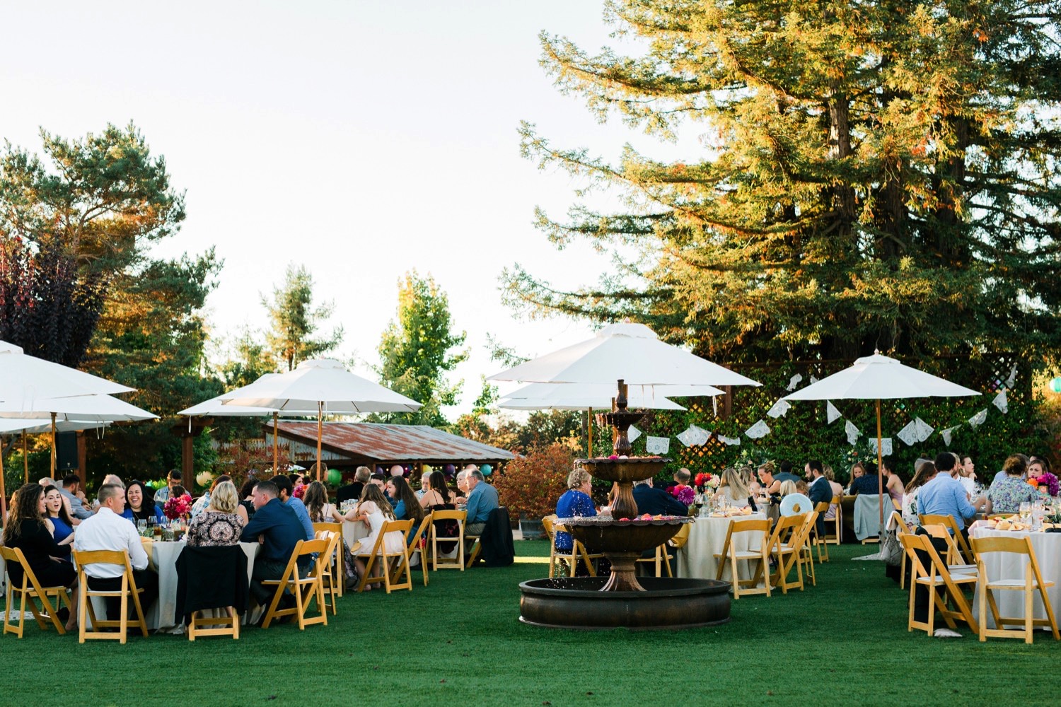 outdoor dinner at Sova Gardens captured by destination wedding photographer