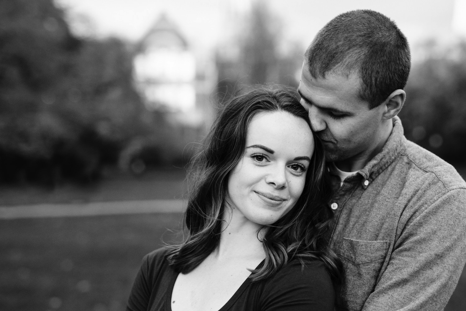a happy couple at their engagement session at University of Washington in Seattle