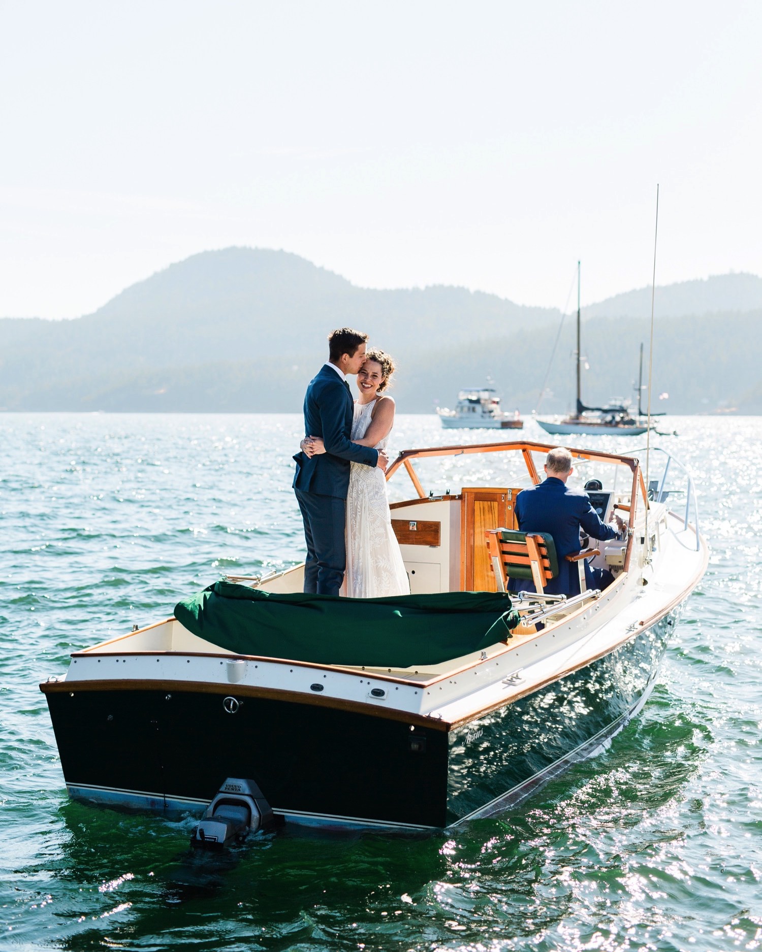 wedding couple on boat at Rosario Resort in Washington
