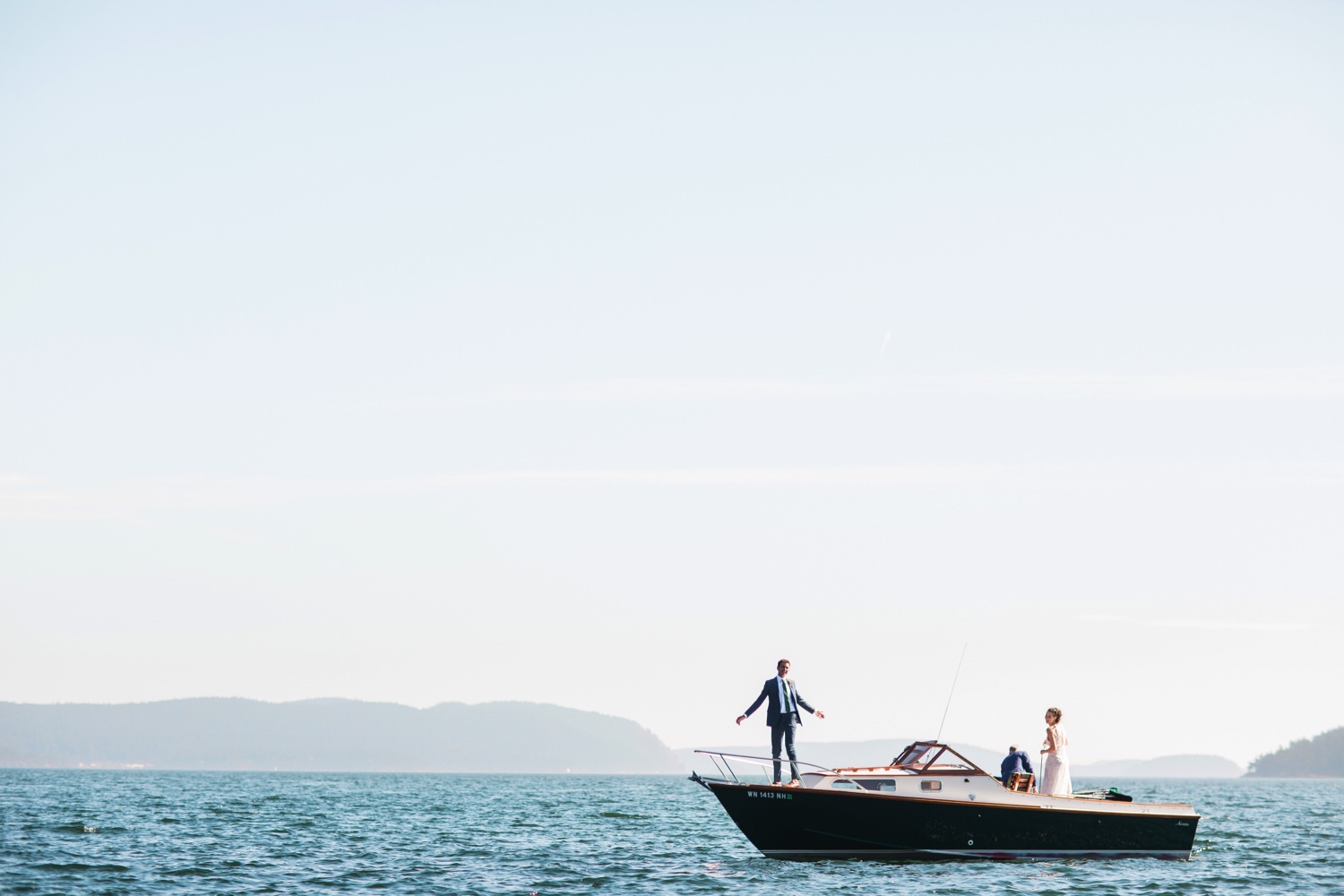 wedding couple on boat at Rosario Resort on Orcas Island