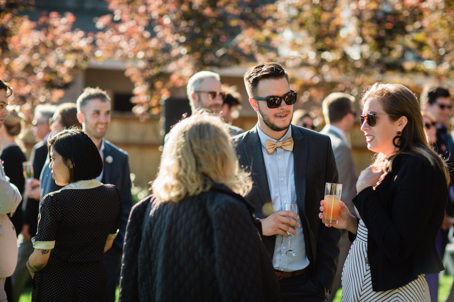 wedding guests talking at cocktail hour on Orcas Island