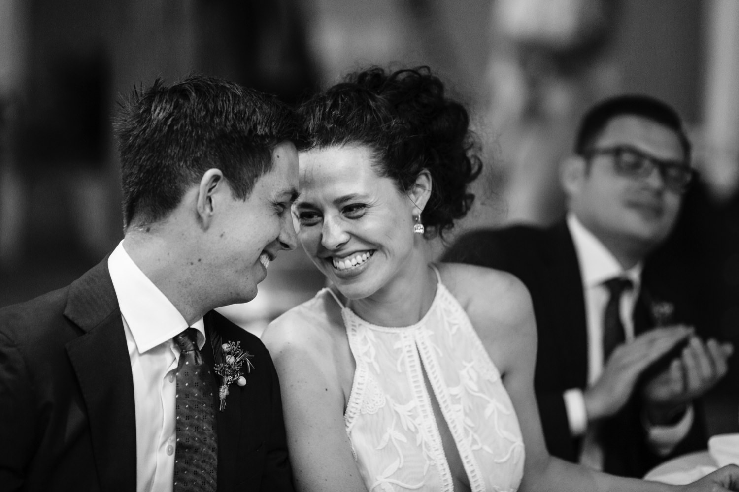 wedding couple laughing during reception