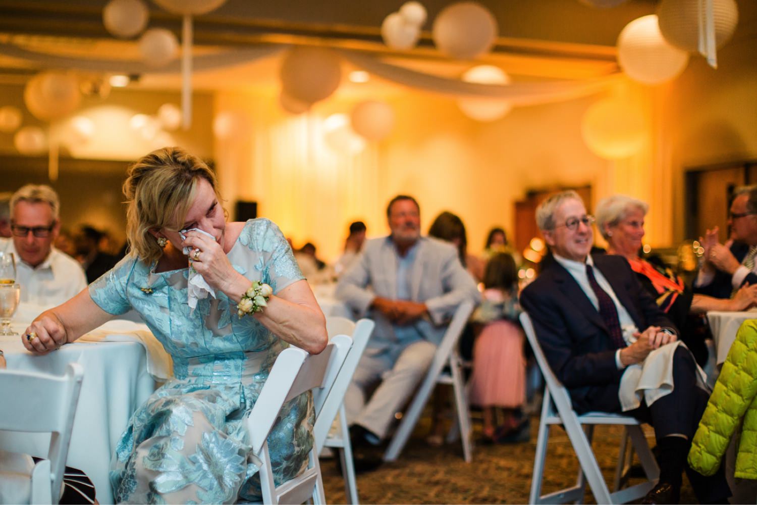wedding guests watching toasts at Rosario Resort
