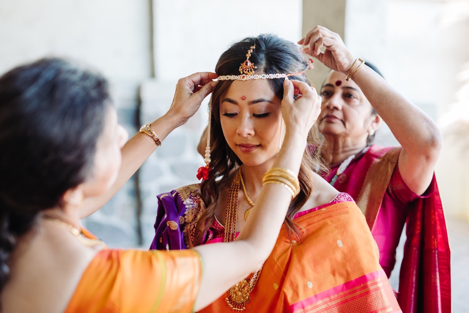 bride getting ready for Indian wedding ceremony