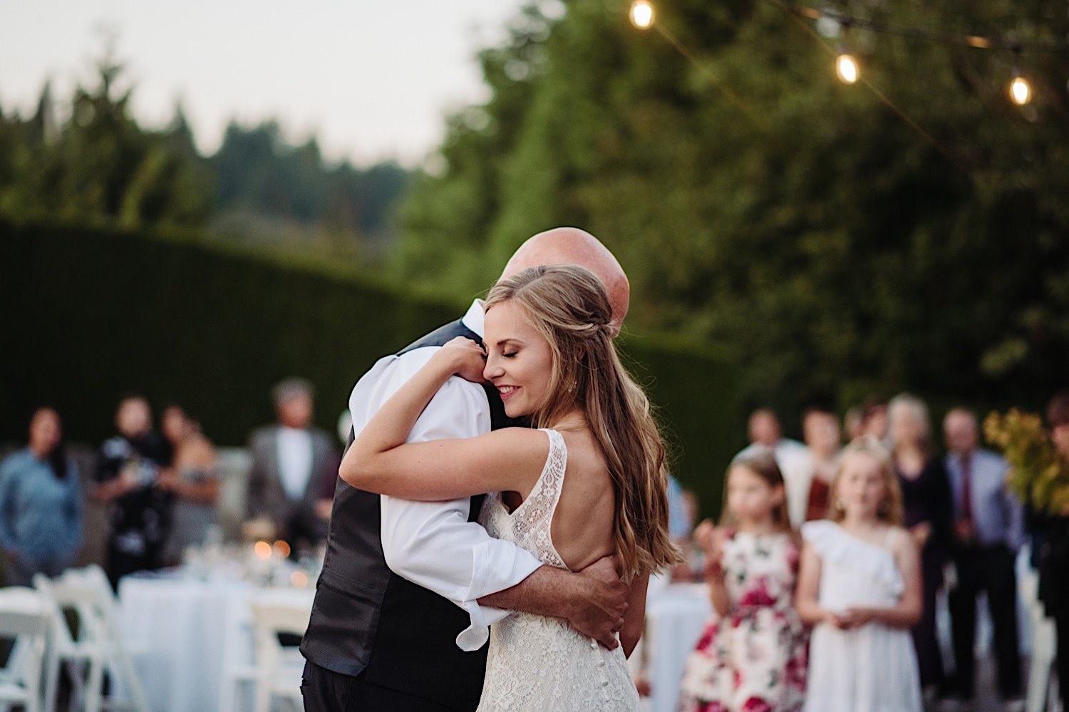 father daughter dance at wedding reception outdoors at Pine Creek Farms and Nursery