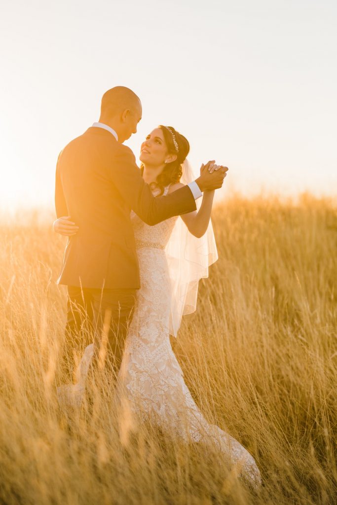seattle wedding photographer captures candid natural wedding portraits in golden light