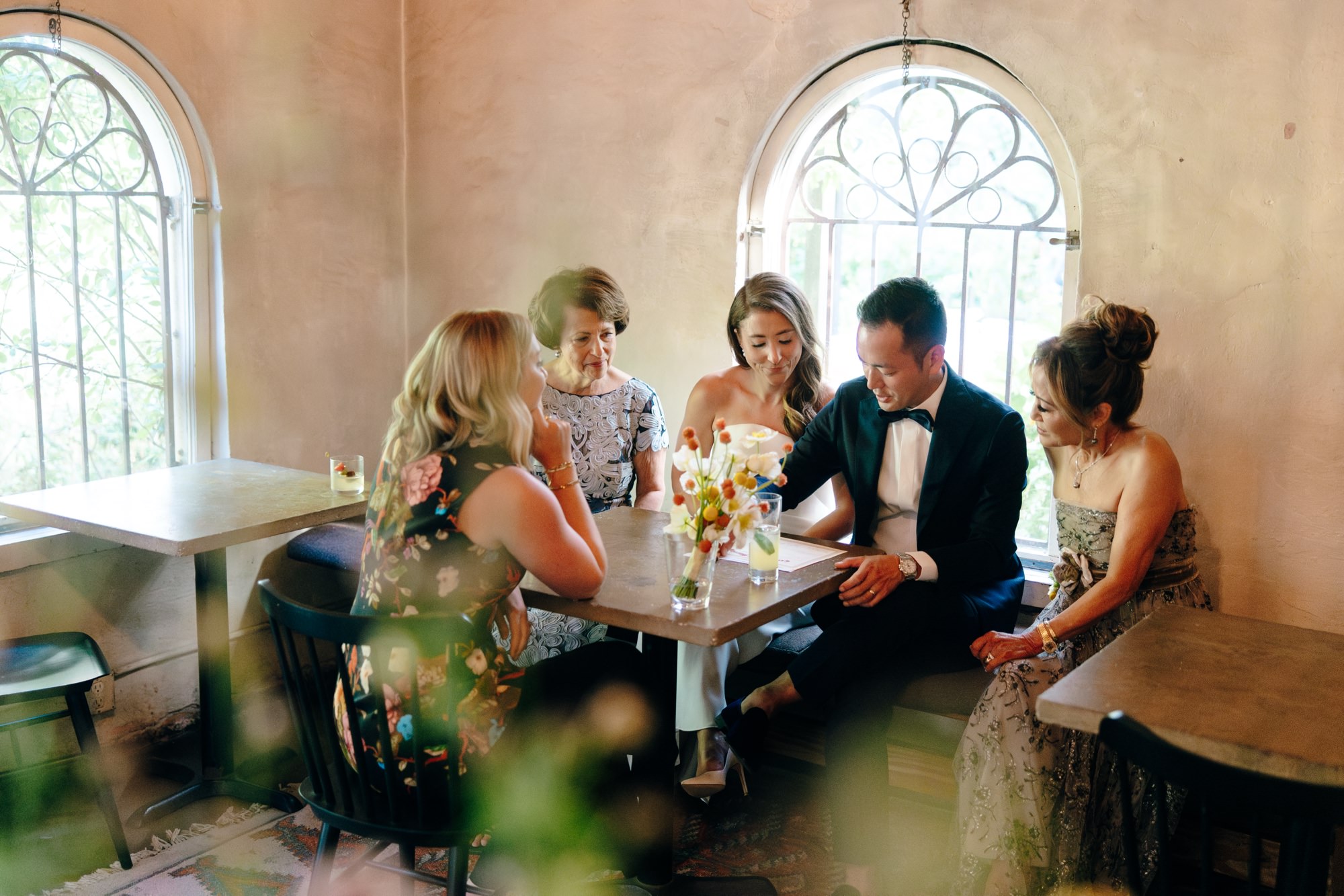 signing the marriage license in the dining room at the Corson Building