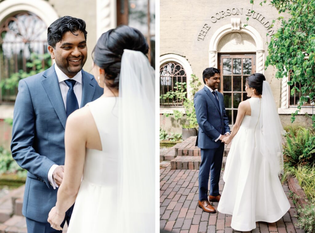 The bride and groom's first look in front of the Corson Building, showcasing their happy expressions and elegant attire.