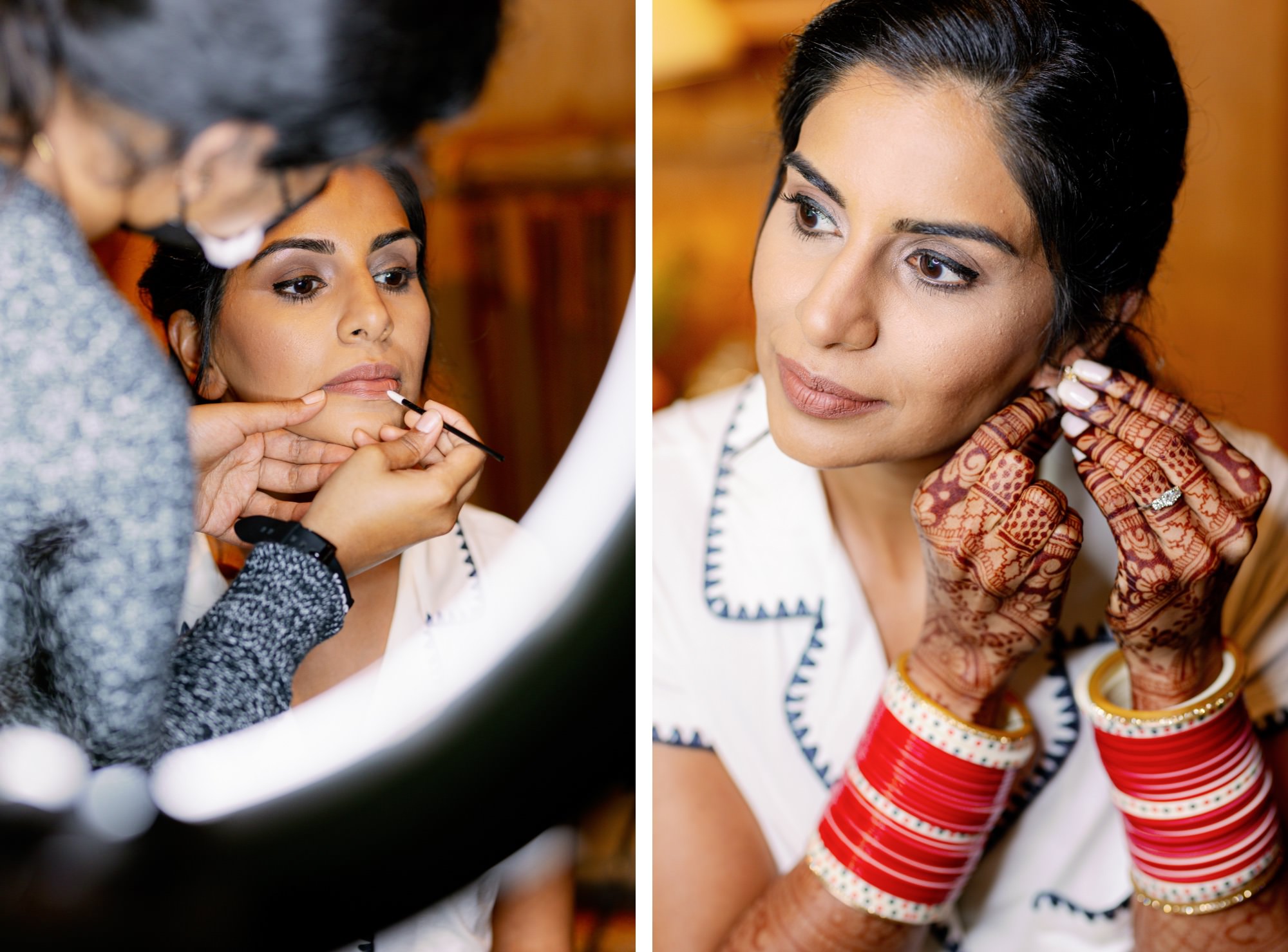 Bride receiving makeup touch-up and putting on earrings as part of her wedding preparations.