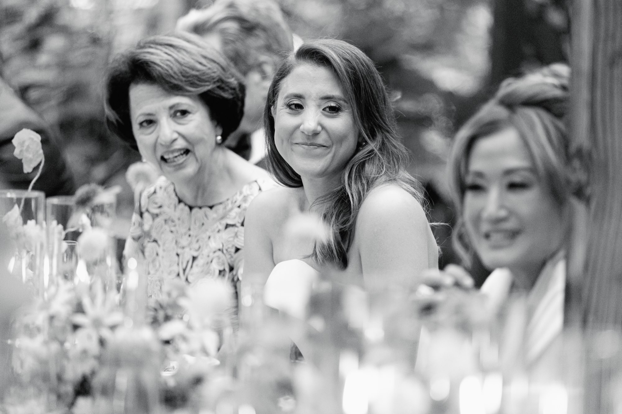 A tender moment during an intimate dinner party wedding