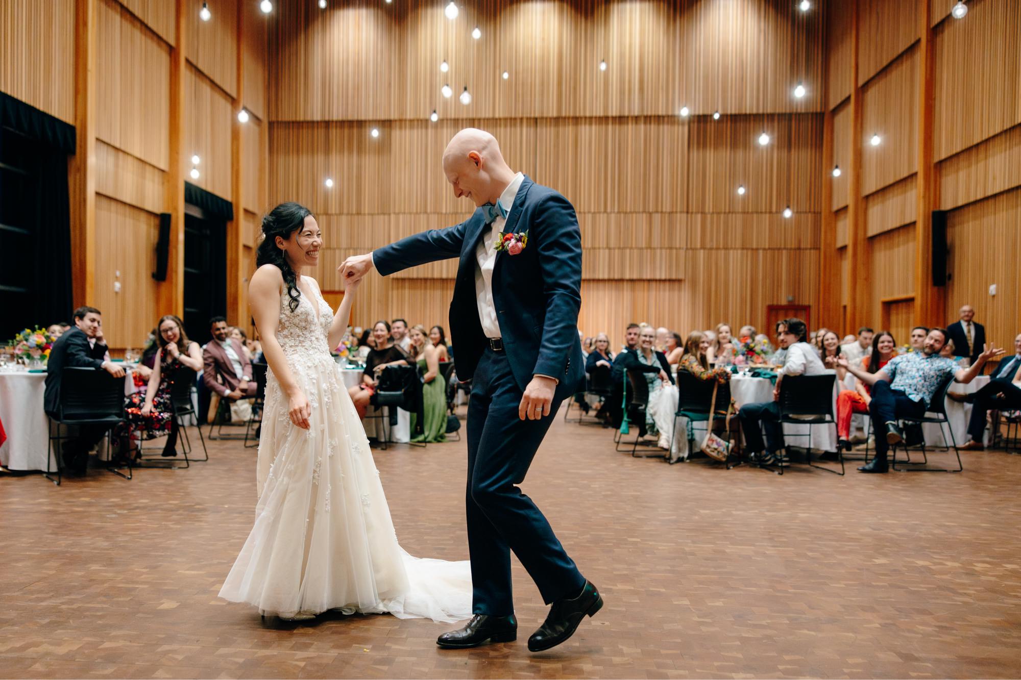 The couple shares a first dance in Osberg Hall at their National Nordic Museum wedding.